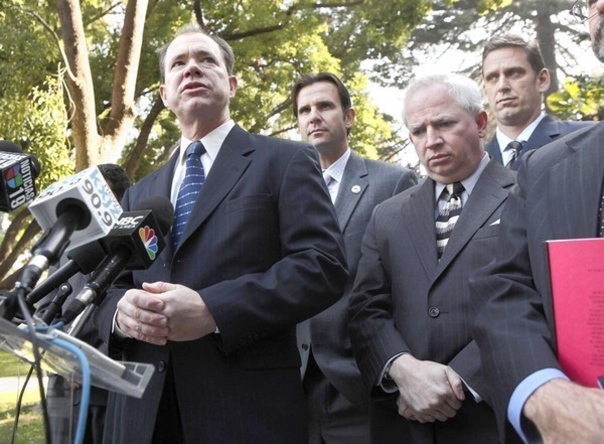 Jon Coupal, president of the Howard Jarvis Taxpayers Assn., is shown at left at a news conference in 2009.