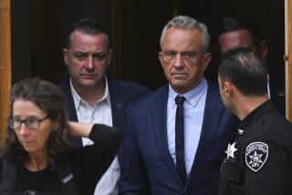 FILE - Independent presidential candidate Robert F. Kennedy Jr., center right, leaves the Albany County Courthouse, Aug. 6, 2024, in Albany, N.Y. (AP Photo/Hans Pennink, File)