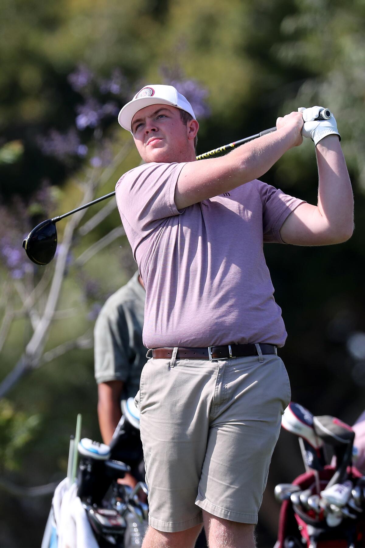 Estancia's Harrison Jones tees off against Costa Mesa during the Battle for the Bell golf match on Wednesday, May 5, 2021.