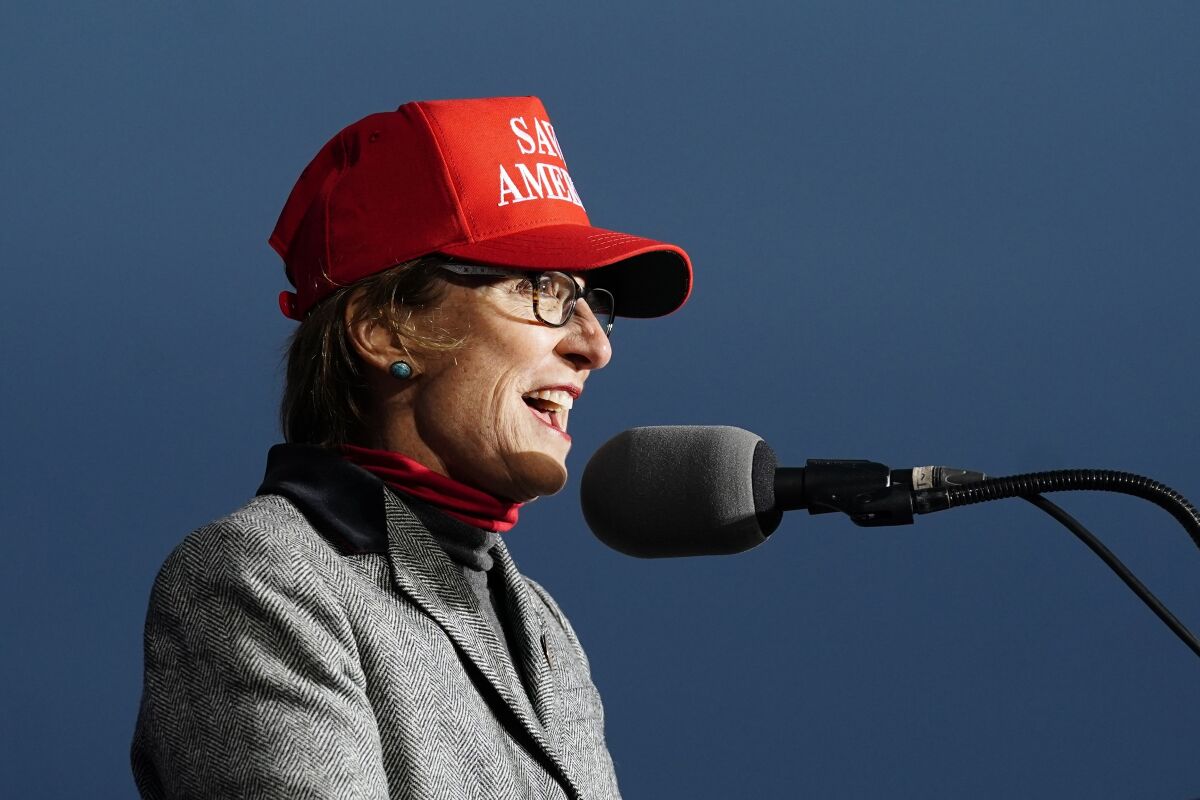 FILE - Arizona state Sen. Wendy Rogers, R-Flagstaff, speaks at a Save America Rally prior to former president Donald Trump speaking Saturday, Jan. 15, 2022, in Florence, Ariz. Democrats pushed unsuccessfully Monday, May 16 to expel Rogers over her online comments about the shooting rampage in Buffalo, N.Y. (AP Photo/Ross D. Franklin, File)