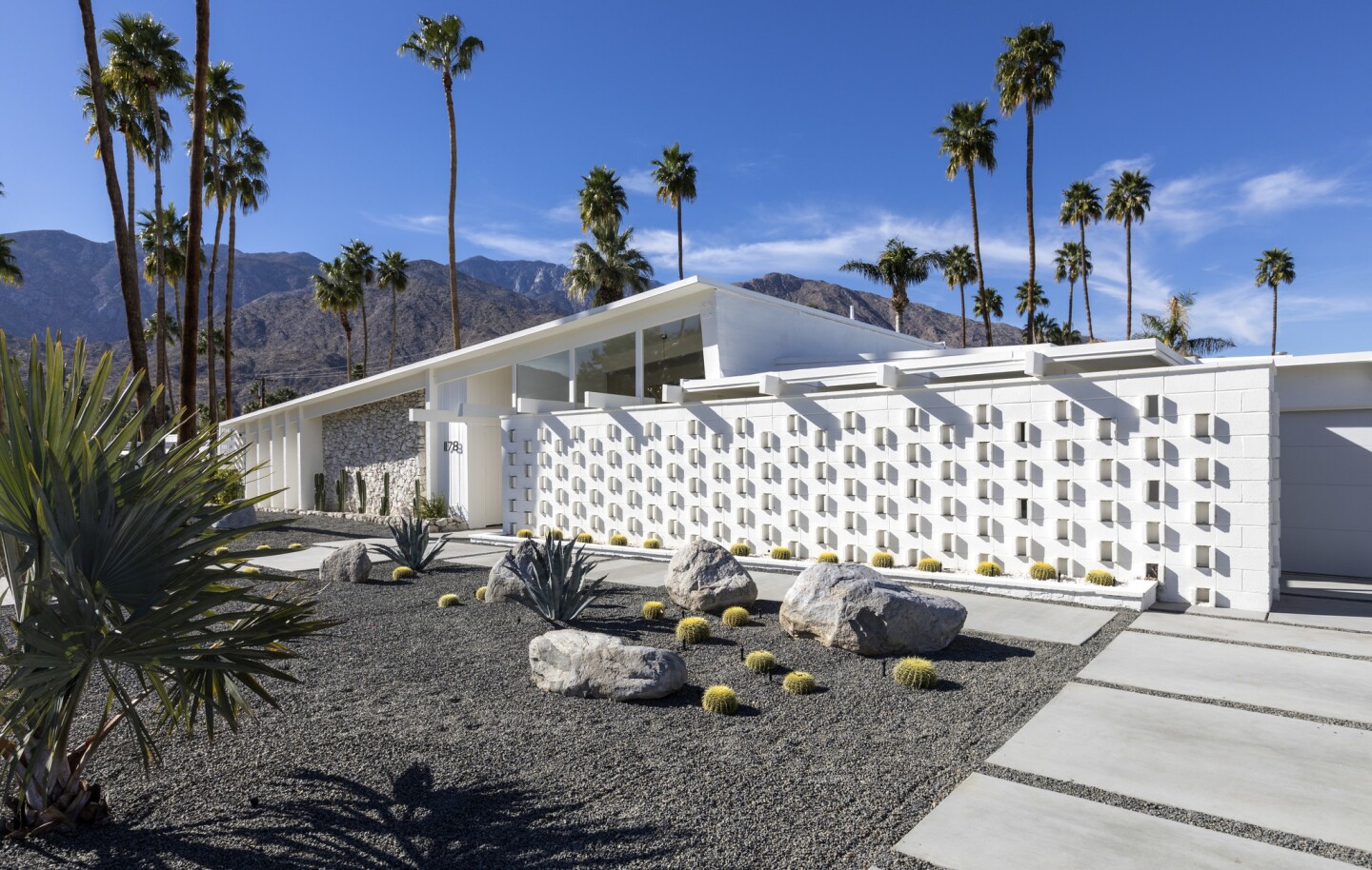 The facade of Ingrid Jackel's 1960 Palm Springs house features classic Midcentury Modern decorative concrete blocks.