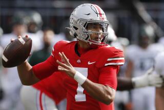 Ohio State quarterback C.J. Stroud drops back to pass against Michigan State during the first half.