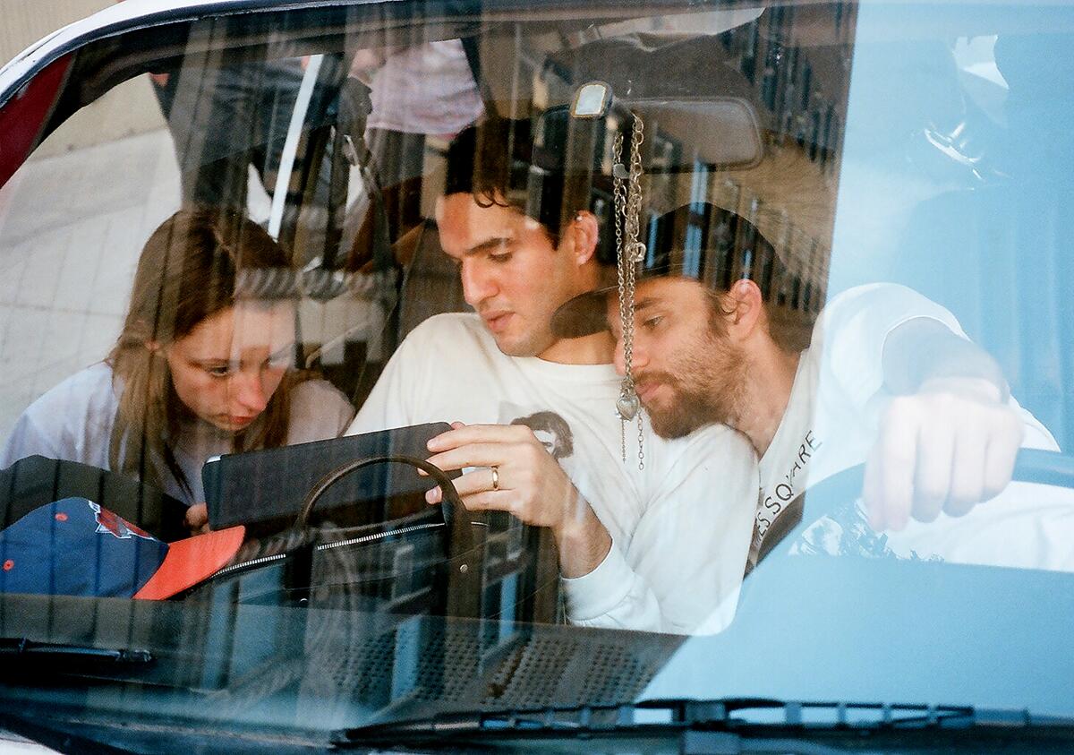 Arielle Holmes and Benny Safdie and John Safdie in the movie "Heaven Knows What."
