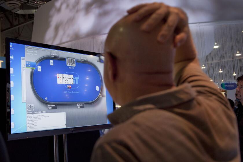 An online poker demonstration at a gambling industry conference in Las Vegas in 2011.