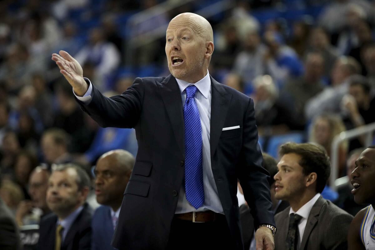 UCLA coach Mick Cronin instructs his players during a game in November 2022.
