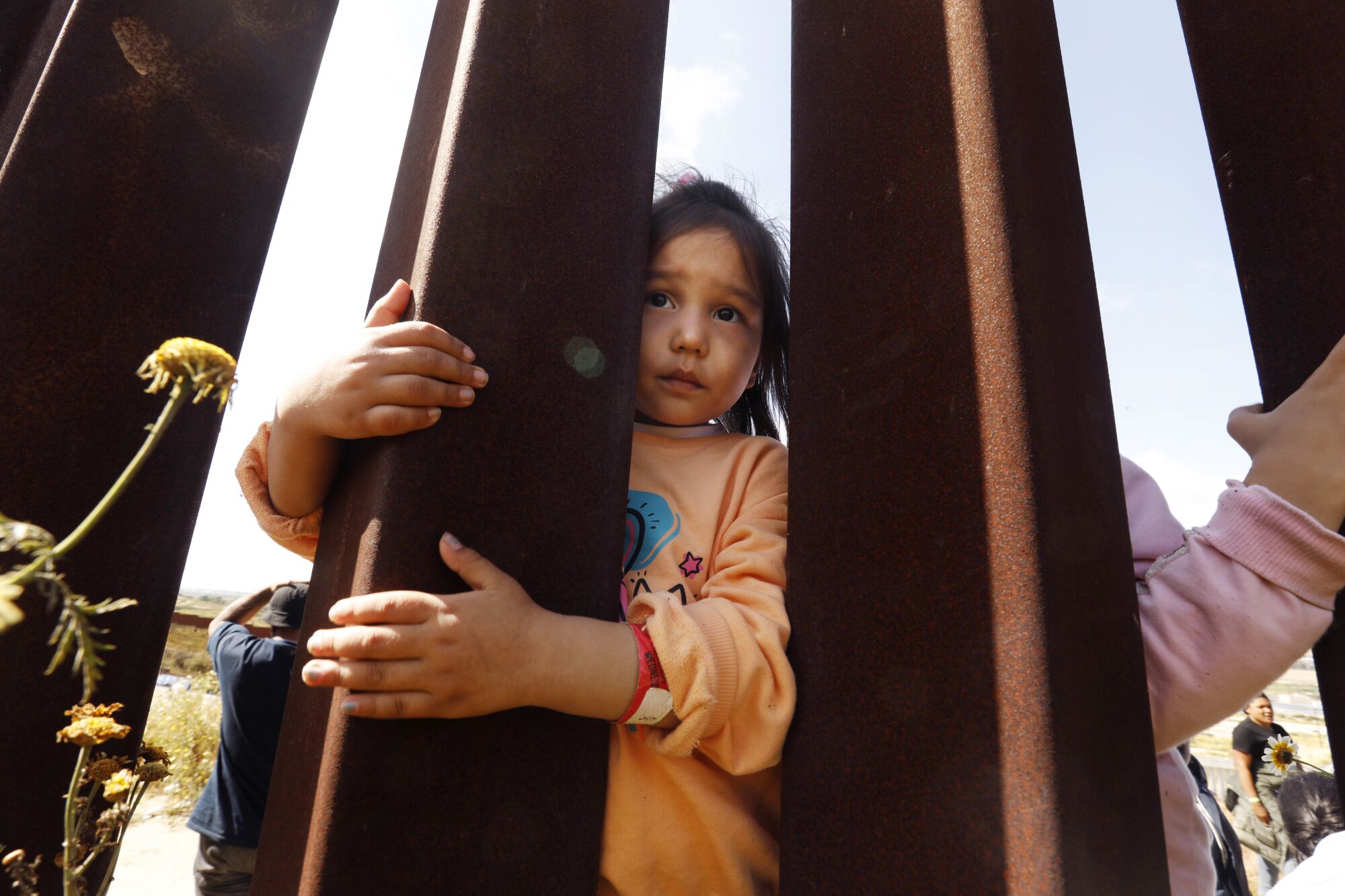 Mahya, age 4, from Afghanisan is waiting with her family to get into the U.S. at the U.S.- Mexico border in Tijuana.