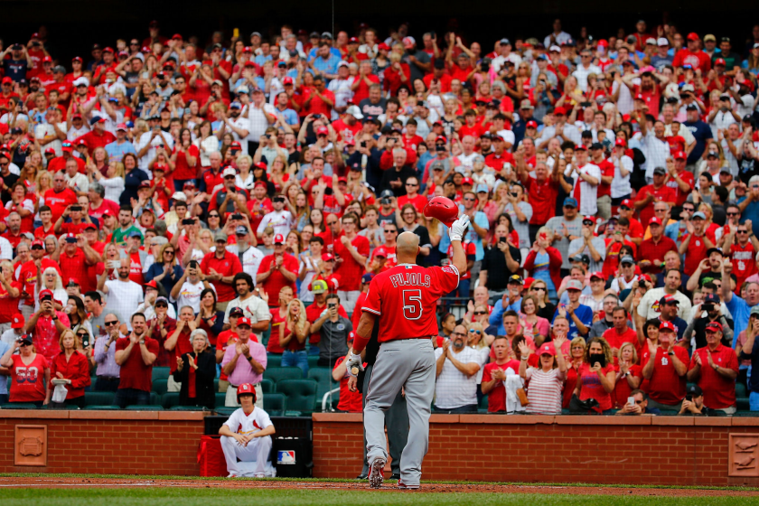 Albert Pujols acknowledges a standing ovation from the Busch Stadium crowd.
