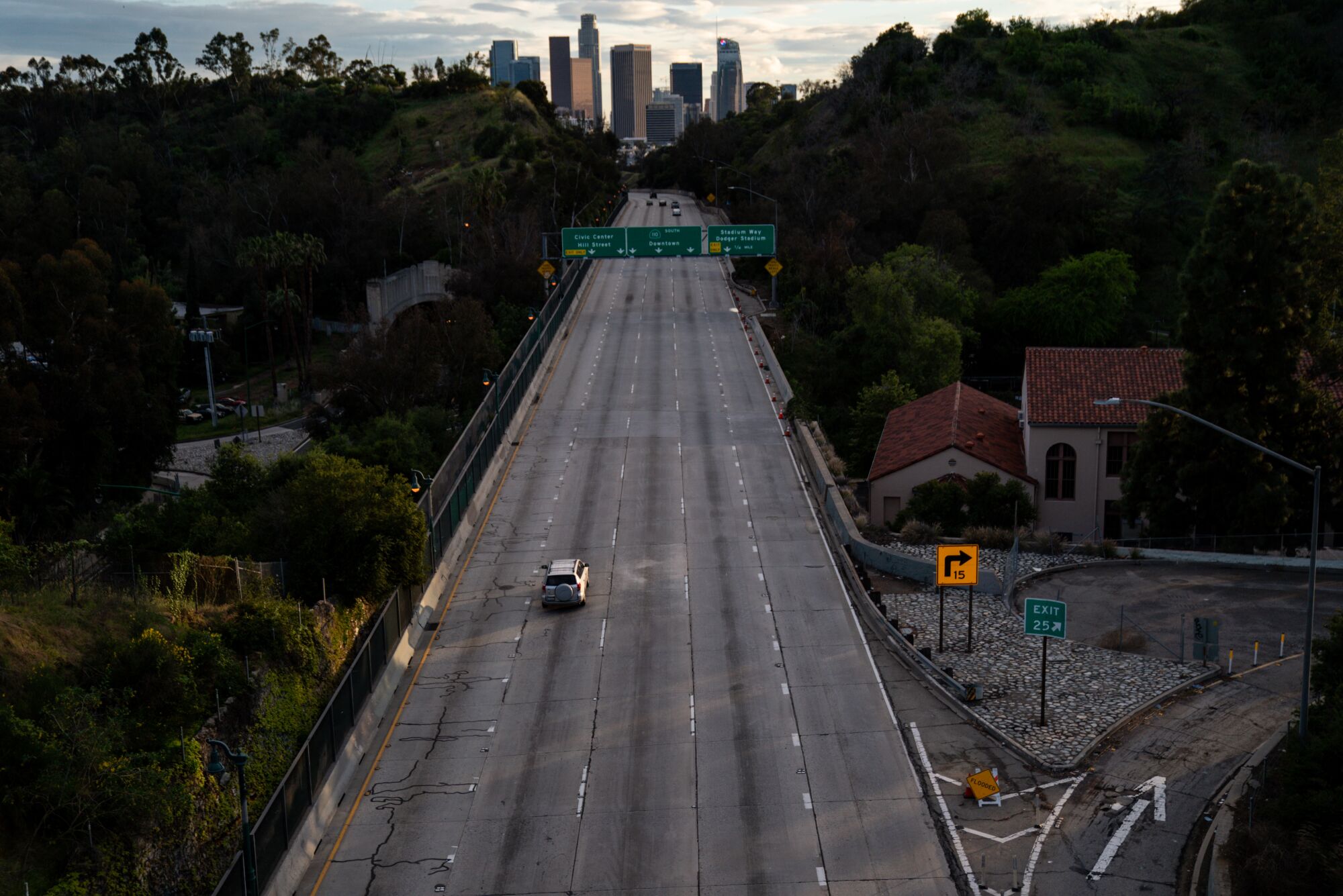 Rush hour on the 110 Freeway doesn't look like it normally does, viewed from a bridge in Elysian Park on April 10. As the Southland enters the Easter holiday weekend, Los Angeles County health officials warned the region needs to increase social distancing to slow the coronavirus spread.