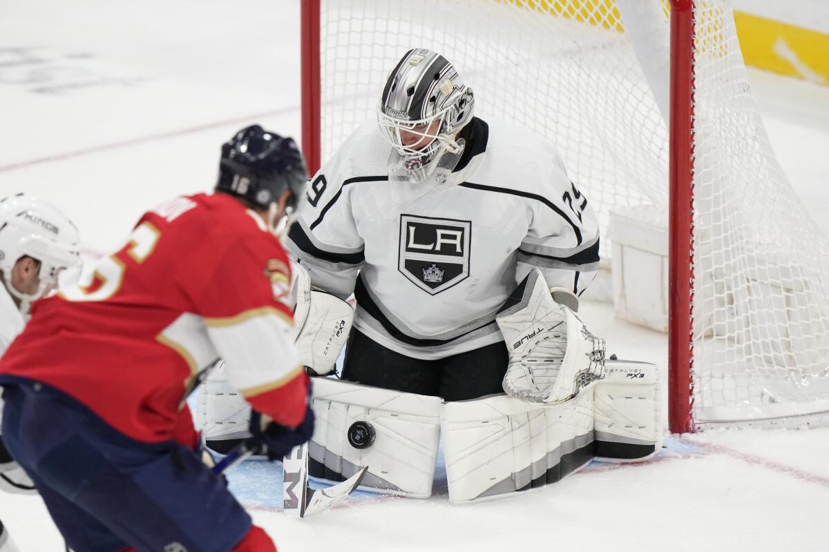 Kings goalie Pheonix Copley stops a shot by the Panthers' Aleksander Barkov, front, during the second period Jan. 27, 2023.