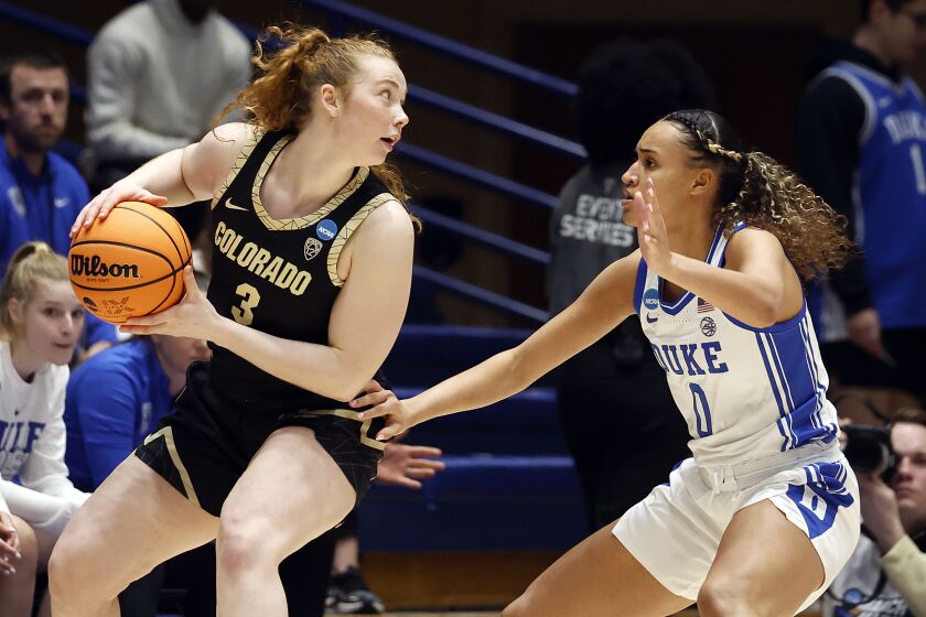 Colorado's Frida Formann (3) controls the ball against Duke's Celeste Taylor (0) during the first half of a second-round college basketball game in the NCAA Tournament, Monday, March 20, 2023, in Durham, N.C. (AP Photo/Karl B. DeBlaker)
