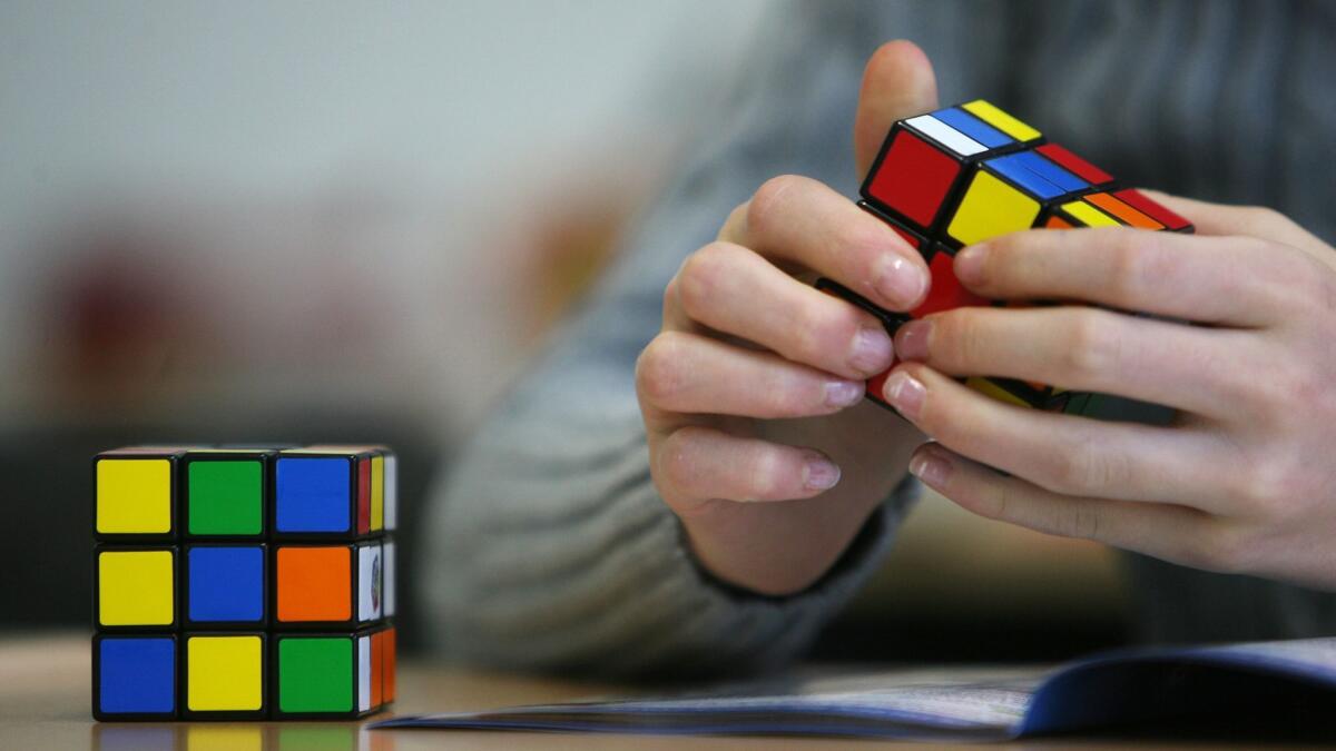 A group of UC Irvine researchers discovered how a machine can teach itself to solve a Rubik's Cube without human assistance.