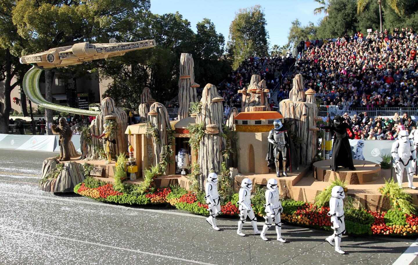 The third section of the Disneyland Resort float, a tribute to the new Star Wars: The Force Awakens movie, rolls down Orange Grove Avenue during the 2016 Rose Parade in Pasadena on Friday, Jan. 1, 2016.