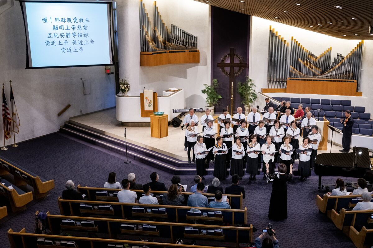 The church choir performs during the memorial service for the Laguna Woods/Irvine Taiwanese Presbyterian Church shooting.