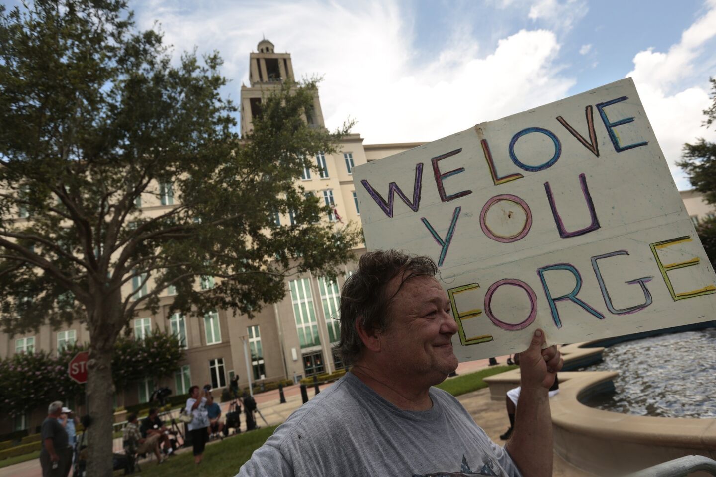 Ed Wilson, of Sanford, came to the Seminole County courthouse for the first time on Saturday, the first full day of jury deliberations in the case. "My emphasis is peace and love. We've always been a peaceful community here in Seminole. Now it's up to the six women" on the jury, he said.