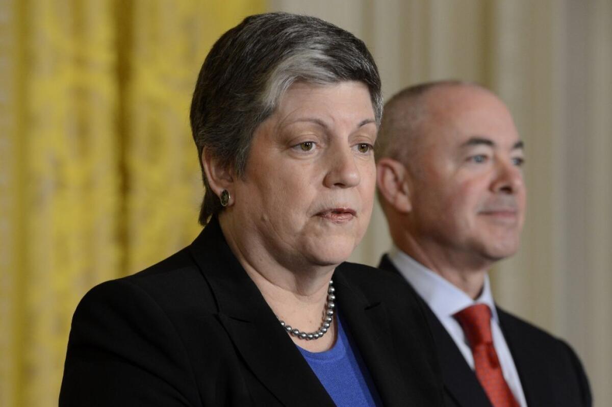 Homeland Security Secretary Janet Napolitano with Alejandro Mayorkas, director of U.S. Citizenship and Immigration Services, at a naturalization ceremony last month.