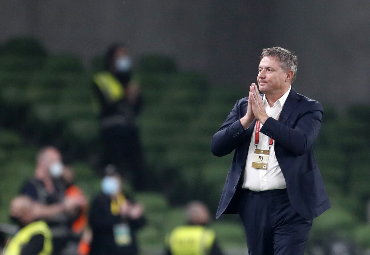 Serbia's coach Dragan Stojkovic reacts during the World Cup 2022 group A qualifying soccer match between Republic of Ireland and Serbia, at Aviva Stadium in Dublin, Tuesday, Sept. 7, 2021. (AP Photo/Peter Morrison)