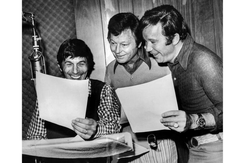 April 24, 1973: From left, Leonard Nimoy, DeForest Kelley and William Shatner – stars of hit TV series "Star Trek" – record their voices in a Los Angeles studio for "Star Trek: The Animated Series."