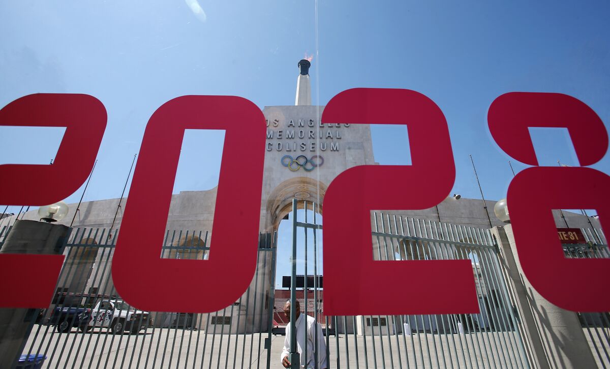 An Olympics 2028 sign in front of the Coliseum.