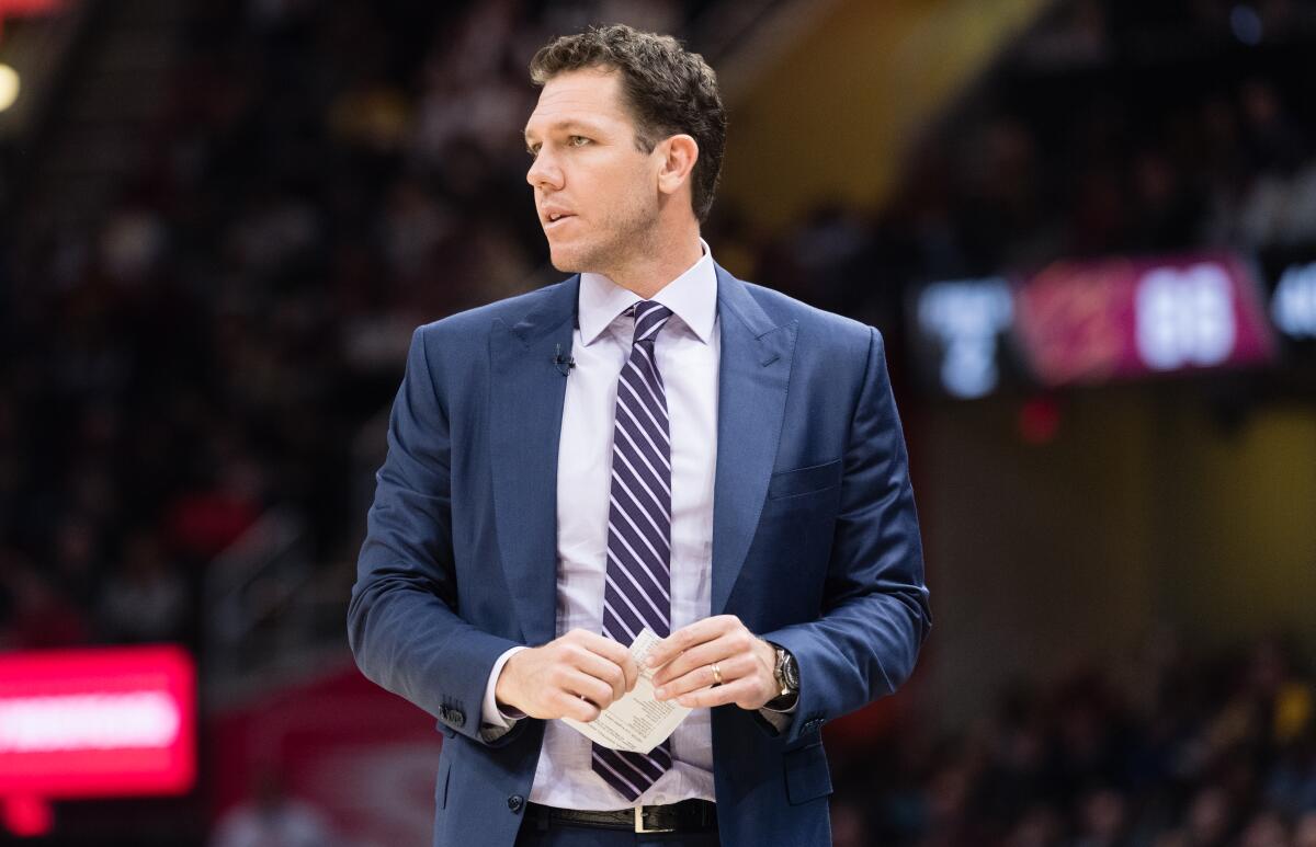 Luke Walton watches the Lakers play the Cleveland Cavaliers during a game in November.