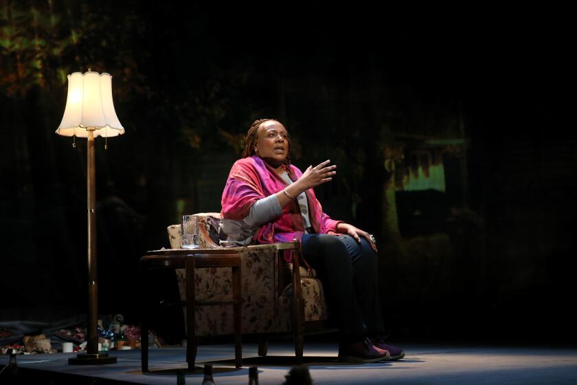 CULVER CITY, CALIF. -- THURSDAY, JANUARY 23, 2020: Dael Orlandersmith as Louisa Hemphill in "Until the Flood," written and performed by Orlandersmith, at the Kirk Douglas Theatre in Culver City, Calif., on Jan. 23, 2020. Orlandersmith's show about social uprising in Ferguson, Missouri following the shooting of teenager Michael Brown. Pulling from her extensive interviews with Missouri residents, Orlandersmith crafts a stunning theatrical experience that must be seen. (Gary Coronado / Los Angeles Times)