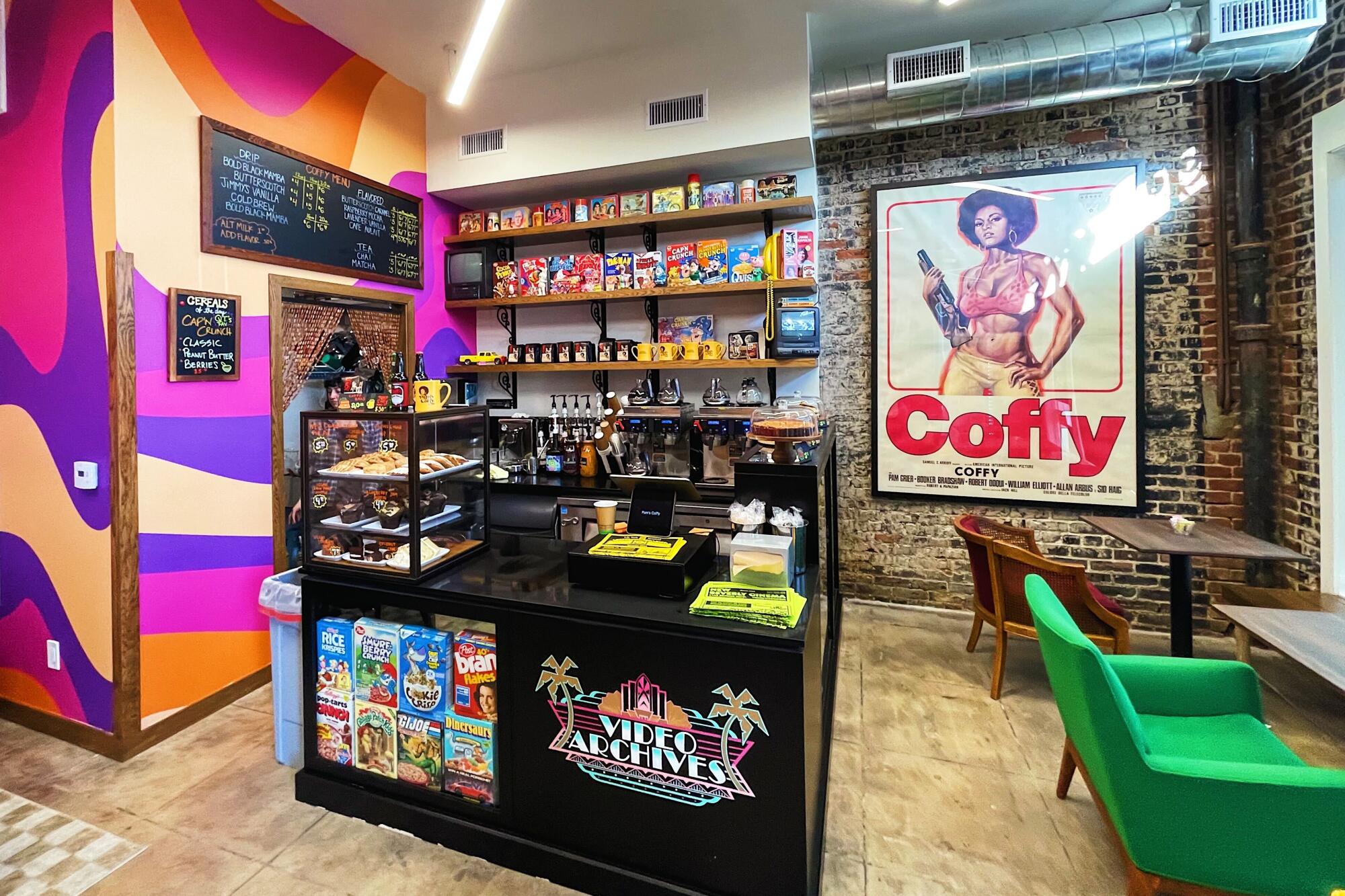 An interior view of Quentin Tarantino's cafe Pam's Coffy with a big Pam Grier movie poster on the wall