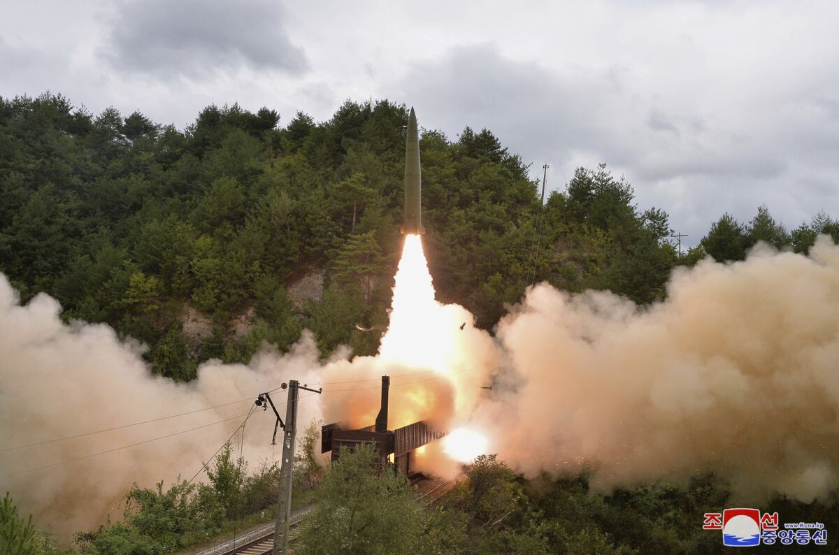 This photo provided by the North Korean government Thursday, Sept. 16, 2021, shows a test missile is launched from a train on Sept. 15, 2021, in an undisclosed location of North Korea. North Korea says it succeeded in launching ballistic missiles from a train for the first time in part of continuing efforts to bolster its “war deterrence,” a day after the two Koreas tested-fired missiles hours apart. Independent journalists were not given access to cover the event depicted in this image distributed by the North Korean government. The content of this image is as provided and cannot be independently verified. Korean language watermark on image as provided by source reads: "KCNA" which is the abbreviation for Korean Central News Agency. (Korean Central News Agency/Korea News Service via AP)