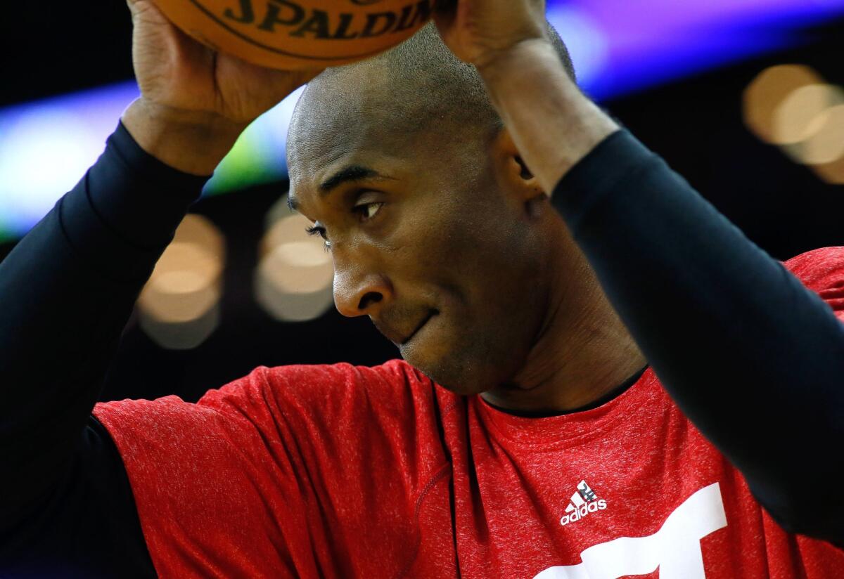 Kobe Bryant warms up before the Lakers' game against the New Orleans Pelicans on Jan. 21.