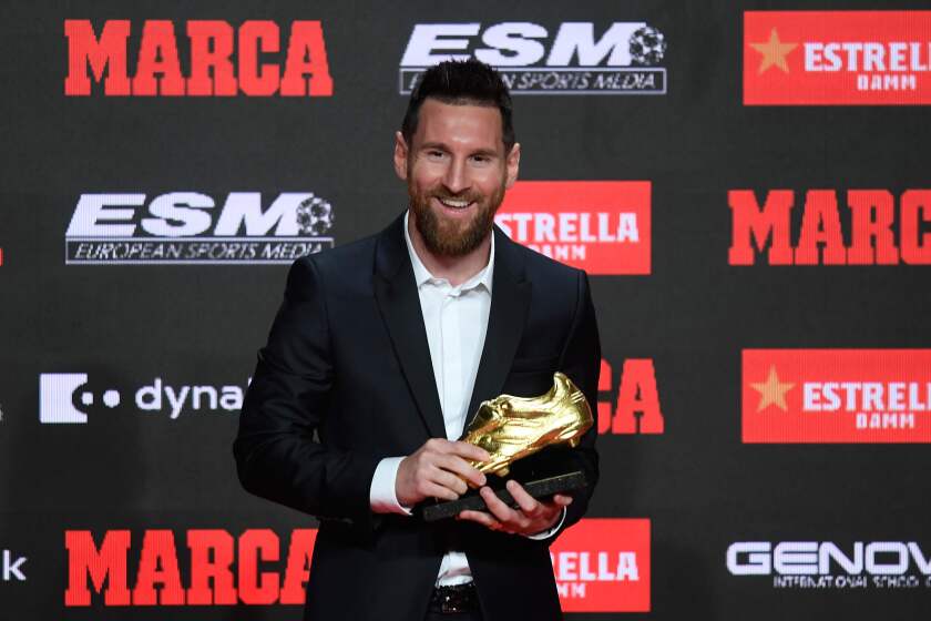 TOPSHOT - Barcelona's Argentinian forward Lionel Messi poses with his sixth Golden Shoe awards after receiving the 2019 European Golden Shoe honoring the year's leading goalscorer during a ceremony at the Antigua Fabrica Estrella Damm in Barcelona on October 16, 2019. (Photo by Josep LAGO / AFP) (Photo by JOSEP LAGO/AFP via Getty Images) ** OUTS - ELSENT, FPG, CM - OUTS * NM, PH, VA if sourced by CT, LA or MoD **