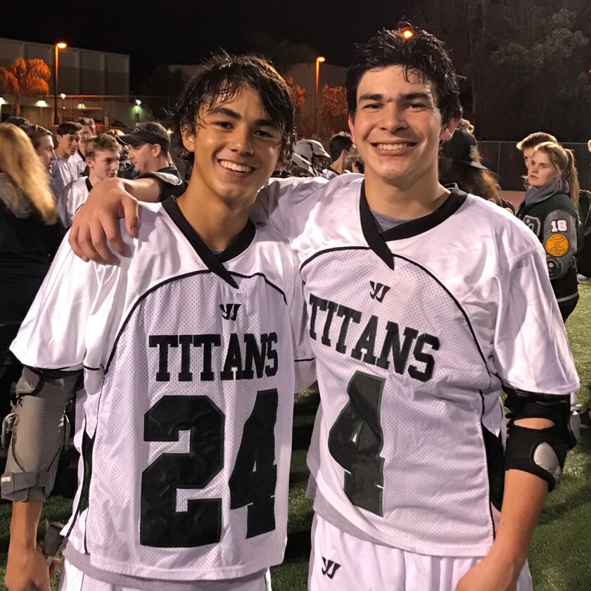 Marquez White and Eli Butler after a lacrosse game with the Poway High Titans.