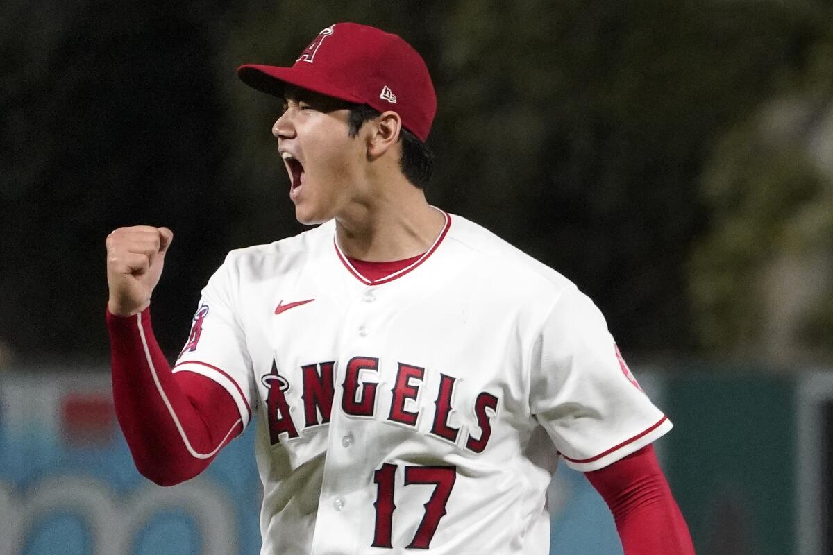 Los Angeles Angels starting pitcher Shohei Ohtani celebrates after striking out Houston Astros' J.J. Matijevic to end the top of the sixth inning of a baseball game Wednesday, July 13, 2022, in Anaheim, Calif. (AP Photo/Mark J. Terrill)