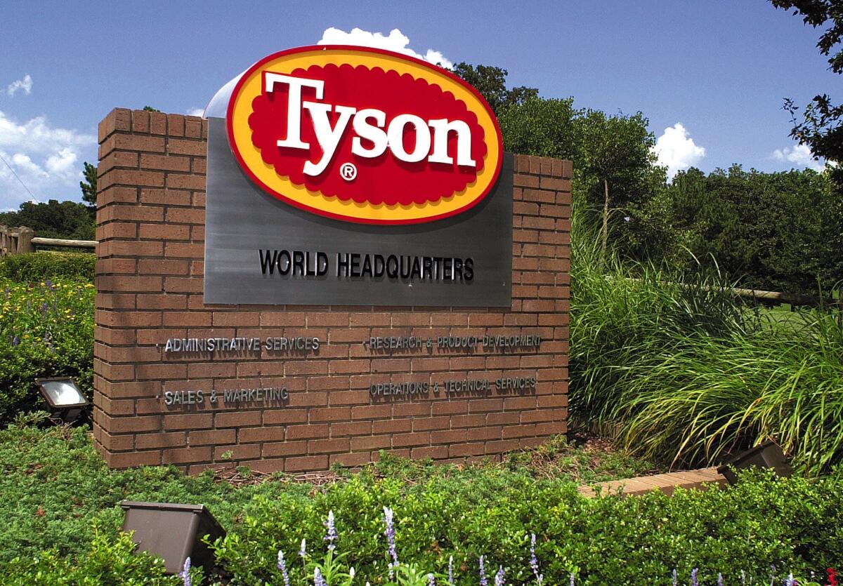 A Tyson Foods sign marks the entrance to the company's headquarters in Springdale, Ark., on July 30, 2001.