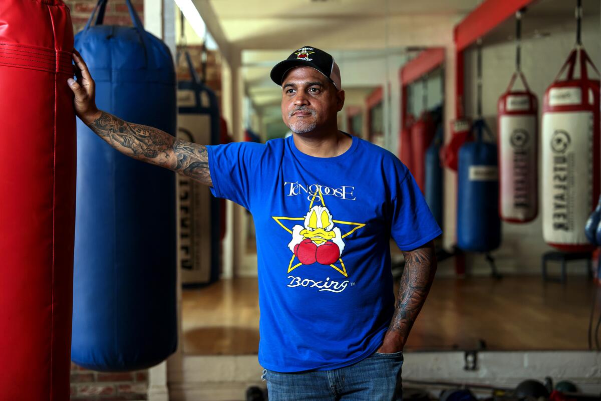 Ricky Funez, owner of the Ten Goose Boxing Gym in Van Nuys, said he was falsely charged with a criminal misdemeanor. His gym has been closed since March, following city orders, he said.