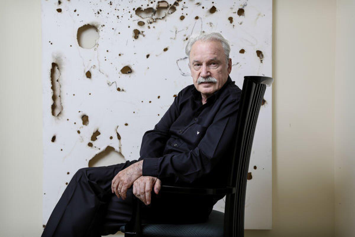 Giorgio Moroder, here relaxing at home, kept the EDM crowd moving during his set at the Hard Day of the Dead festival on Sunday.