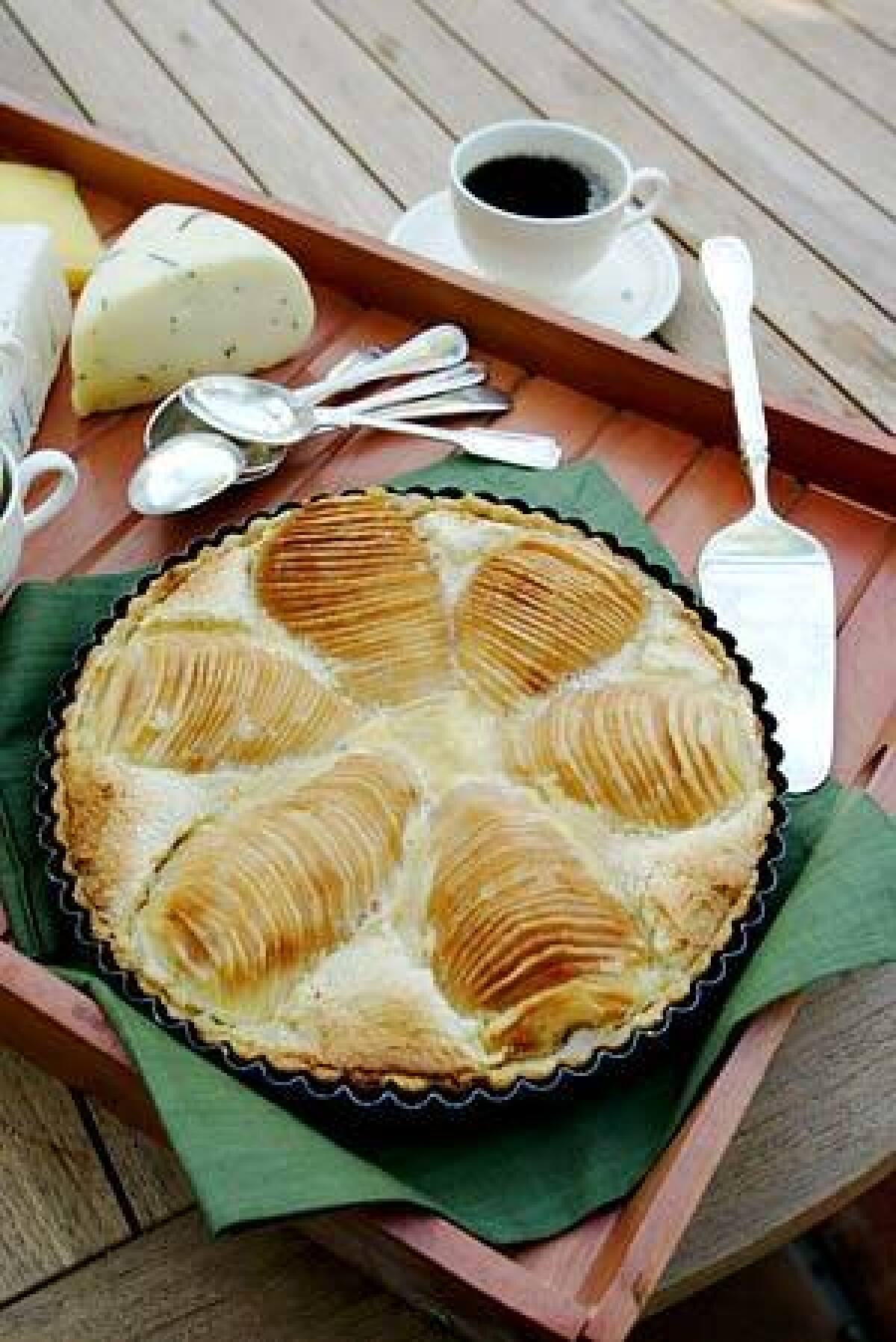 THE DESSERT: Pear frangipane tart showcases Bartlett pears in an orange-and-almond filling.