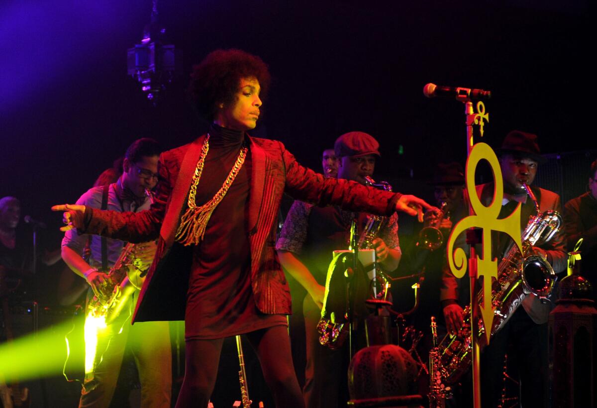Prince, shown during his performance in March at the Hollywood Palladium, has signed a new contract with Warner Bros. Records and will release a new studio album at an unspecified date.