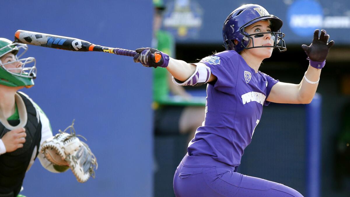 Washington's Sis Bates drives in the game's first run against Oregon during the third inning Thursday.