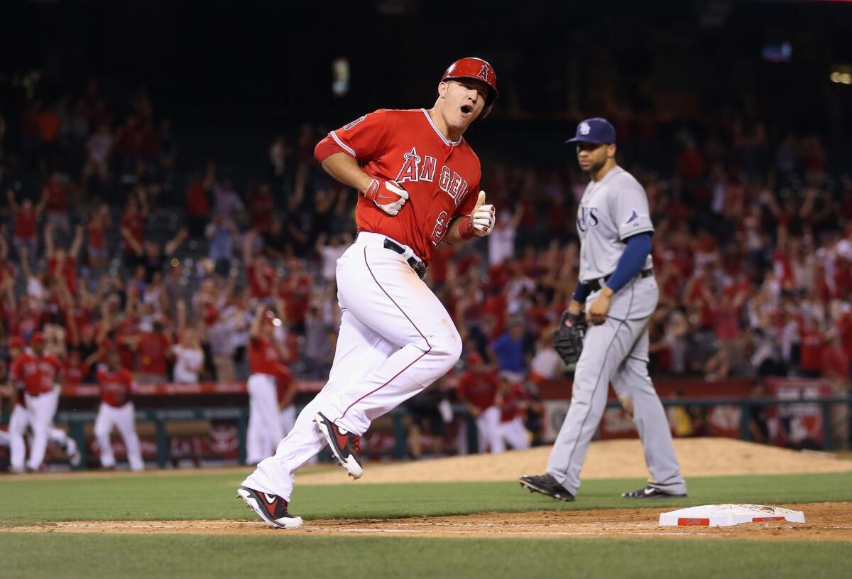 Mike Trout hit his first walk off home run of his career Thursday with a three-run shot in the bottom of the ninth inning to give the Angels a 6-5 win over the Tampa Bay Rays.