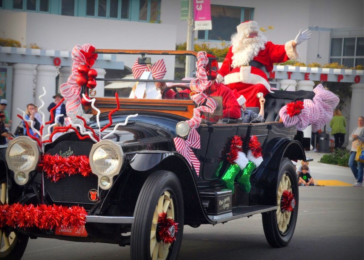 Santa Claus arrives at a previous La Jolla Christmas Parade. The 2019 event starts 1:30 p.m. Sunday, Dec. 8 with the parade route on Girard Avenue and Prospect Street. A Holiday Festival outside the Athenaeum Music & Arts Library, 1008 Wall St., runs 11 a.m. to 1 p.m. prior to the start of the parade.