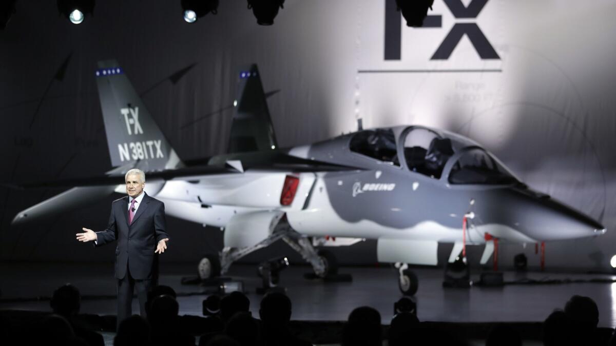Darryl Davis, president of Boeing Phantom Works, reveals Boeing's proposed T-X Trainer aircraft in 2016.