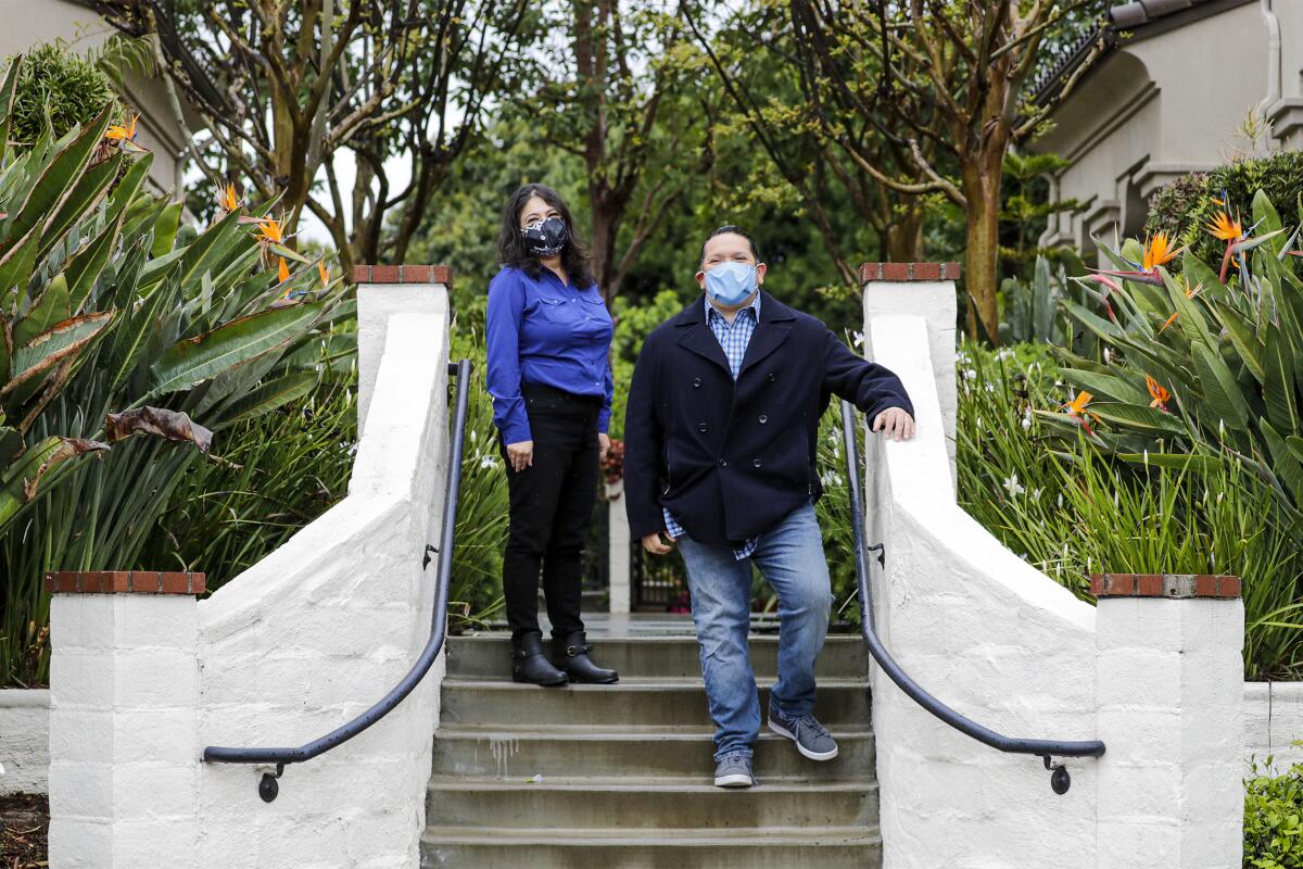 El Monte couple Rosalina Nava and Danny Herrera were initially resistant to wearing face masks. 