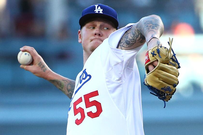 Dodgers pitcher pitcher Mat Latos pitches against the Chicago Cubs during the second inning on Saturday.