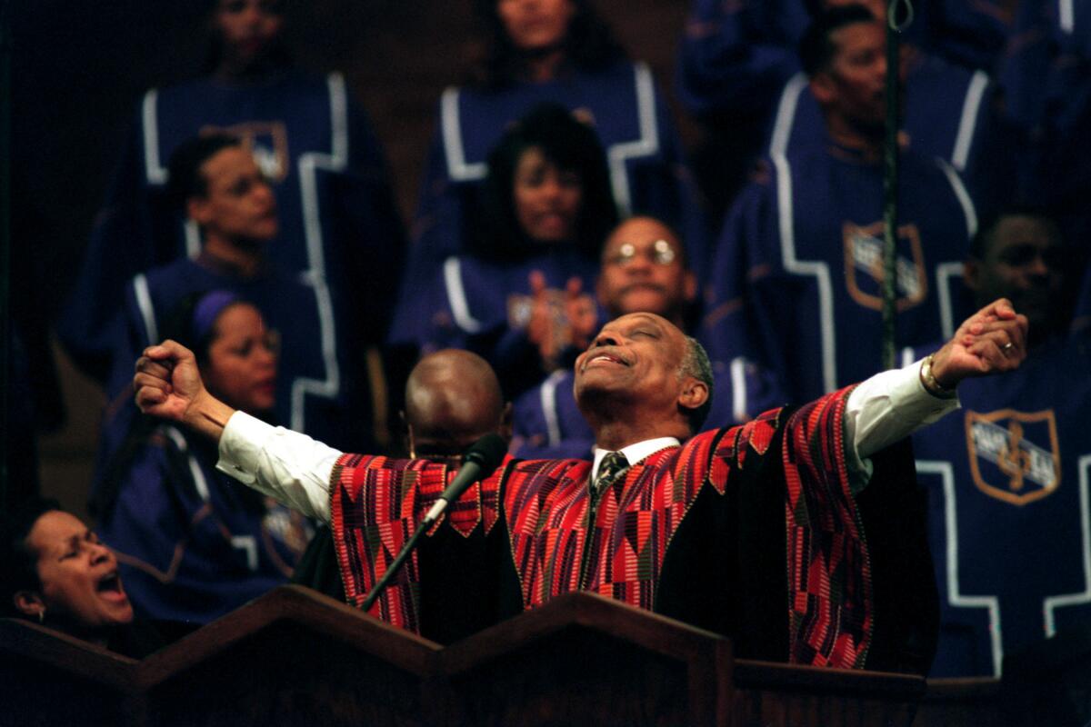 The Rev. Cecil "Chip" Murray celebrates mass at the First AME Church in Los Angeles in the late 1990s. 