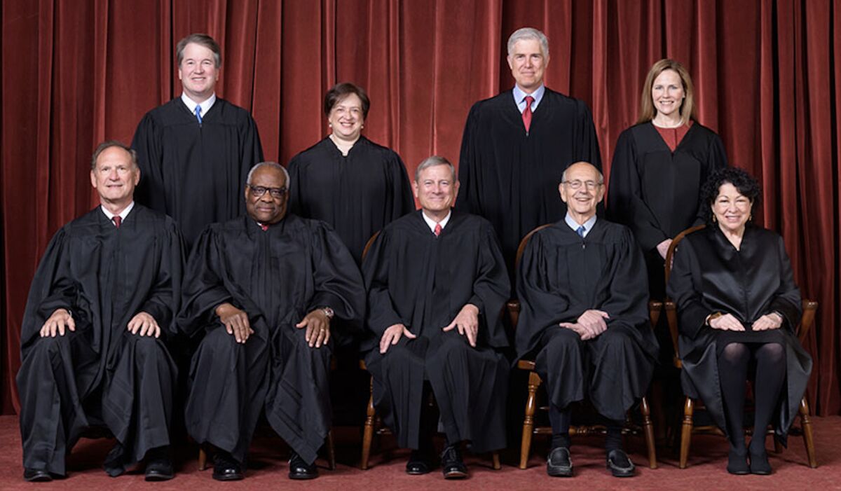 The Supreme Court justices pose for a portrait