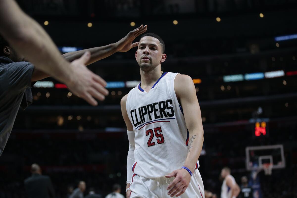 Clippers guard Austin Rivers leaves the court after being ejected during first half against the Timberwolves on Feb. 3.