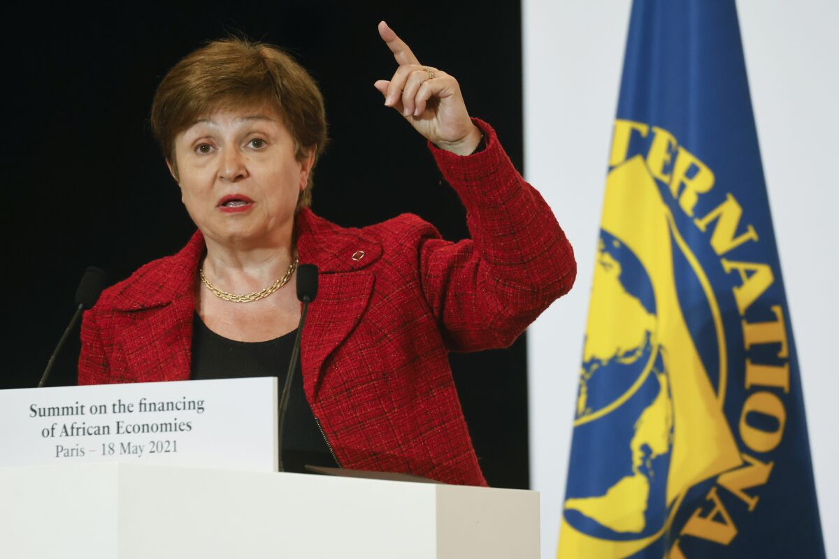 FILE - In this May 18, 2021 file photo, International Monetary Fund Managing Director Kristalina Georgieva speaks at the end of the Financing of African Economies Summit, in Paris. Georgieva met on Wednesday, Oct. 6 with her agency's executive board, which is conducting an investigation into alleged data-rigging at the World Bank, the sister global lender where she was formerly was a top executive. The IMF is investigating allegations that in 2018 World Bank employees were pressured to alter data affecting its business-climate rankings of China and other nations. (Ludovic Marin, Pool via AP, File)