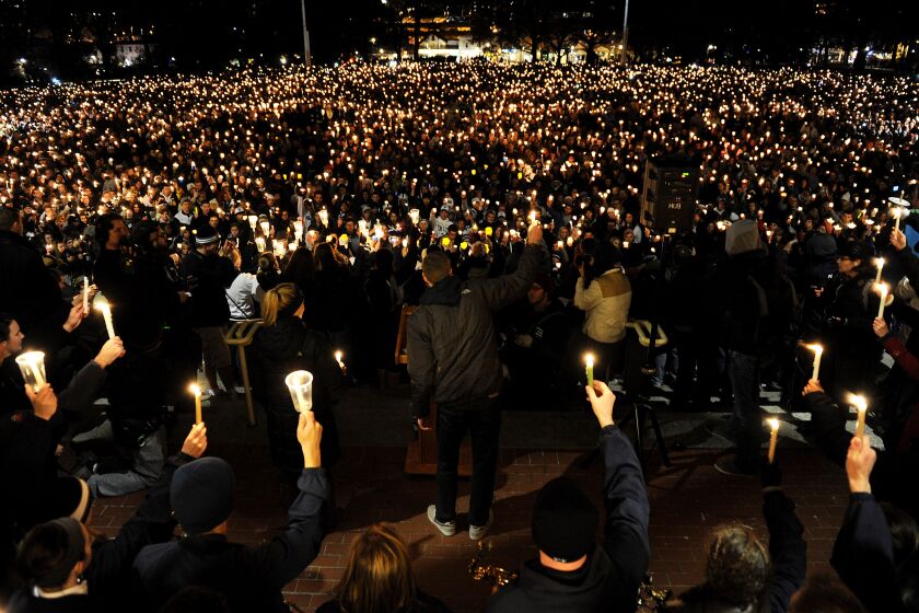 STATE COLLEGE, PA - NOVEMBER 11: Penn State Unversity students hold a candlelight vigil for abused victims in the Penn State scandal on Old Main Lawn November 11, 2011 in State College, Pennsylvania. Former Penn State football defensive coordinator Jerry Sandusky is charged with raping a boy in the shower of the football building. (Photo by Patrick Smith/Getty Images) ORG XMIT: 132070233