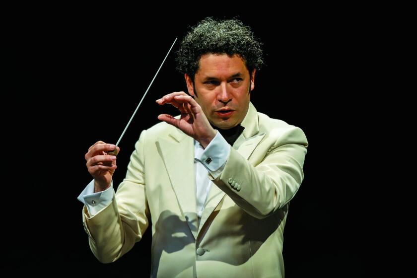 LOS ANGELES,CA --TUESDAY, AUGUST 22, 2017--Conductor Gustavo Dudamel leads "The Planets," with the L.A. Philharmonic, at the Hollywood Bowl, in Los Angeles, CA, Aug. 22, 2017. (Jay L. Clendenin / Los Angeles Times)