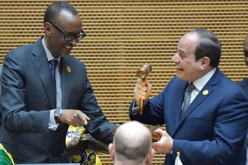 Egyptian President Abdel Fattah al-Sisi (R) speaks with outgoing African Union Chairman and Rwandan President Paul Kagame, after al-Sisi was elected new Chairman of the African Union during the 32nd African Union (AU) summit in Addis Ababa on February 10, 2019. - While multiple crises on the continent will be on the agenda of heads of state from the 55 member nations, the two-day summit will also focus on institutional reforms, and the establishment of a continent-wide free trade zone. (Photo by SIMON MAINA / AFP)SIMON MAINA/AFP/Getty Images ** OUTS - ELSENT, FPG, CM - OUTS * NM, PH, VA if sourced by CT, LA or MoD **