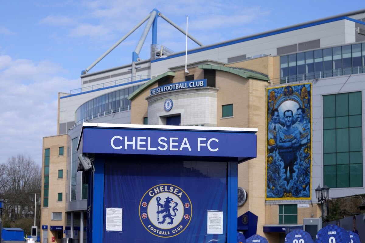 A view of Chelsea football club's Stamford Bridge stadium in London, Thursday, March 10, 2022. Unprecedented restrictions have been placed on Chelsea’s ability to operate by the British government after owner Roman Abramovich is targeted in sanctions. Abramovich is among seven wealthy Russians who had their assets frozen by the government. (AP Photo/Kirsty Wigglesworth)