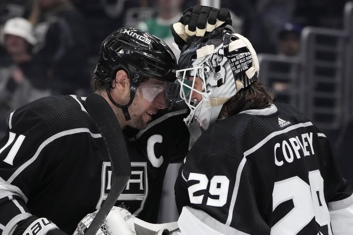 Kings center Anze Kopitar celebrates with goaltender Pheonix Copley after the team's 4-1 win over the Columbus Blue Jackets.